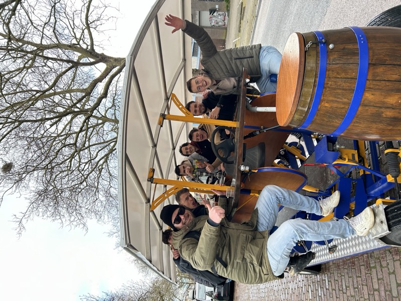 Group on beer bike in the countryside